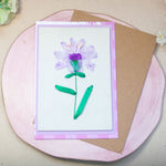 Елегантна ръчно бродирана картичка с лилаво цвете