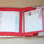 Коледен албум в червено с декорации на елхи и снежинки