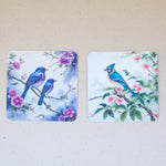Две подложки със сини птици и цъфтящи клонки