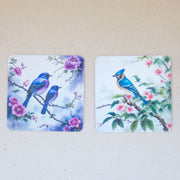 Две подложки със сини птици и цъфтящи клонки